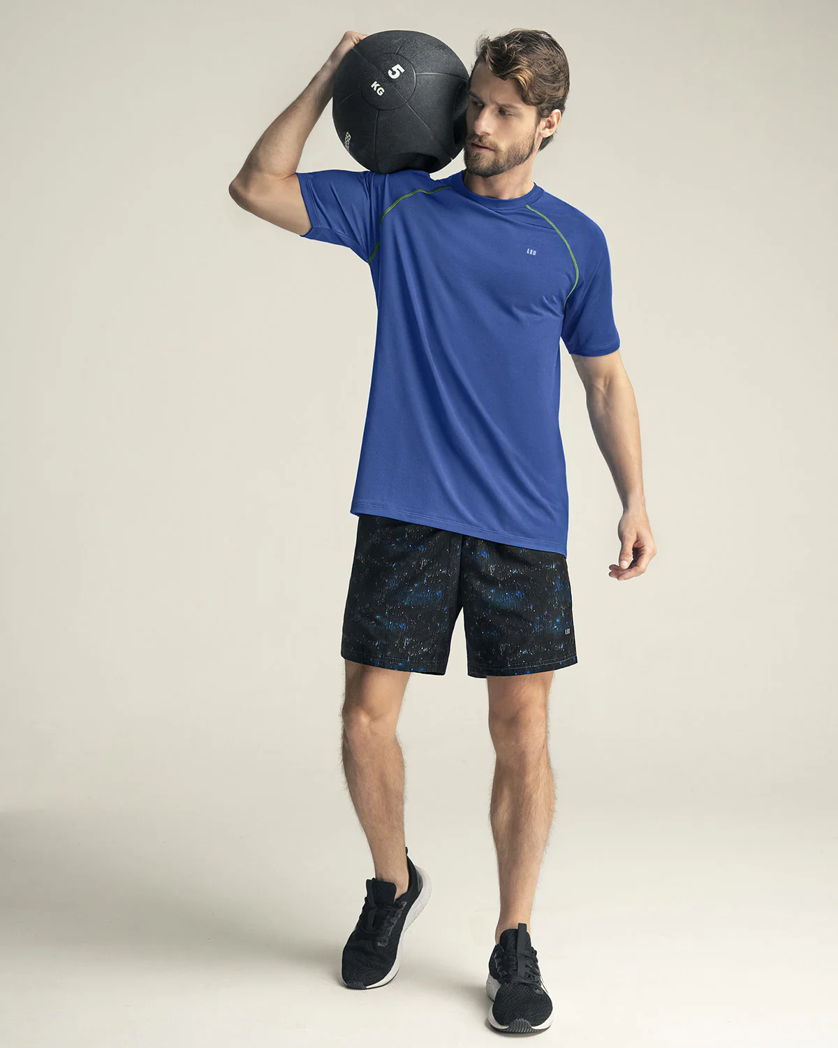 Pantaloneta deportiva con bolsillos funcionales - Image 9